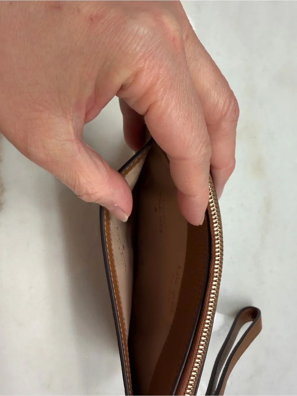 kate spade Brown Pebbled Leather Zip Wristlet with Strap